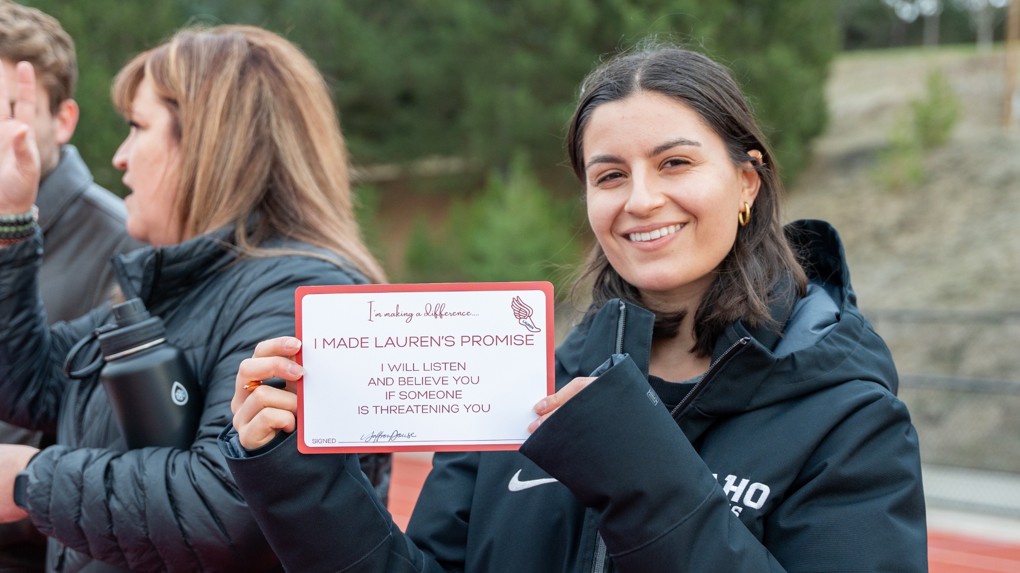 Student making Lauren's Promise at University of Idaho in 2024. Lauren McCluskey memorial walk